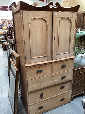 Lot 1304 - Antique pine two height cupboard with two arched panelled doors above, two short and three long drawers below, 99cm wide, 53cm deep, 193cm high