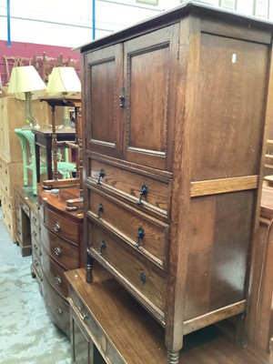 Lot 1309 - Oak tallboy with two panelled doors and three drawers below, 91cm wide, 44.5cm deep, 123cm high