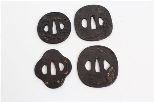 Lot 717 - Four 18th / 19th century Japanese iron and...