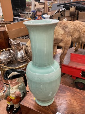 Lot 510 - Chinese celadon glazed vase with character marks to base.