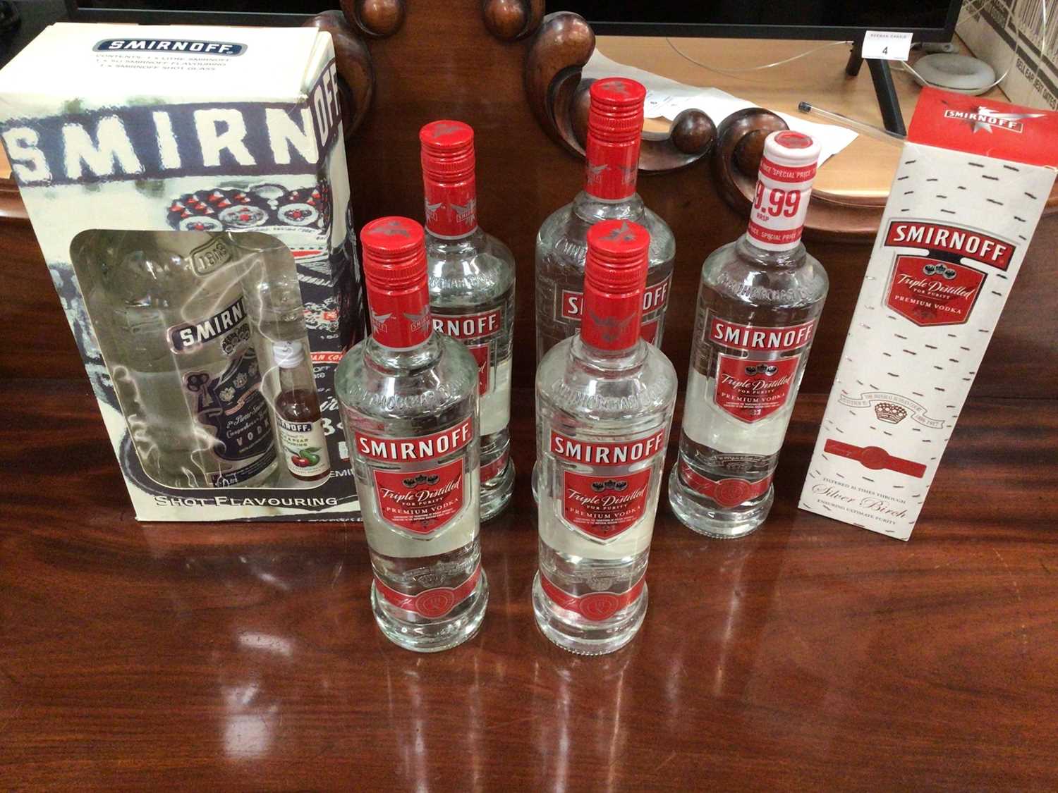 Lot 107 - Seven bottles of Smirnoff vodka