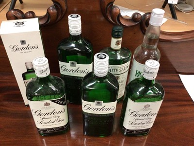 Lot 108 - Seven bottles of gin, including five Gordon's, one Richmond and one White Satin