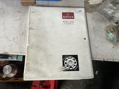 Lot 228 - 1990's Rover Group Dealership wheel trim guide in folder.