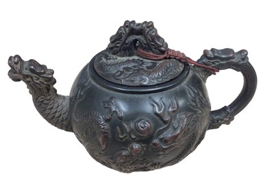 Lot 428 - Chinese terracotta teapot of small proportions, with dragon decoration and seal mark to base
