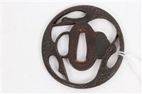 Lot 725 - 18th / 19th century iron tsuba decorated with...