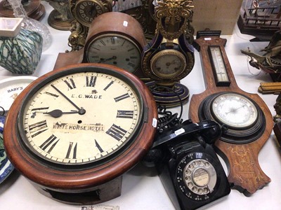 Lot 430 - Various mantle clocks including a brass clock mount/frame, E. G. Wade wall clock with White Horse hotel label, wall barometer and a vintage black telephone