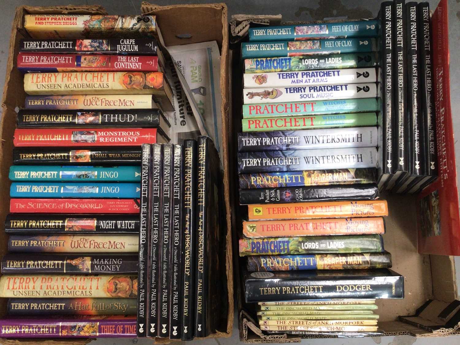 Lot 440 - Collection of Terry Pratchett books (2 boxes)