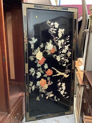 Lot 1343 - Large oriental lacquered panel with applied soapstone floral decoration, 91cm x 192cm