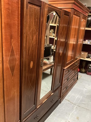 Lot 1344 - Edwardian inlaid mahogany wardrobe with central bevelled mirror door and single drawer below, 127cm wide, 52cm deep, 203cm high