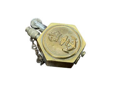 Lot 764 - First World War era brass Trench Art lighter, constructed from two Royal Navy buttons.