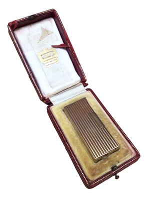 Lot 100 - 9ct gold lighter by A D Bach (Birmingham 1963), in a Cartier leather box