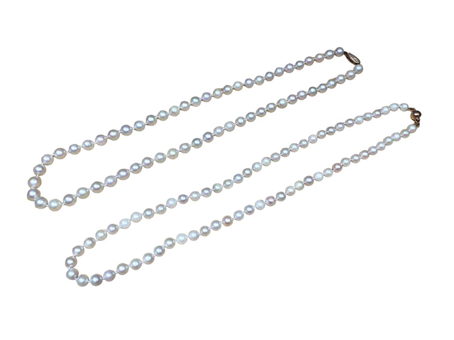 Lot 104 - Two cultured pearl necklaces, both with 9ct gold clasps