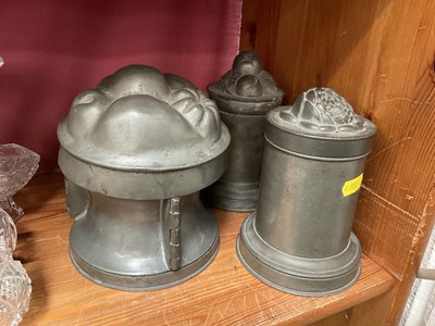 Lot 220 - Three Victorian pewter jelly moulds