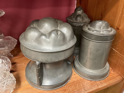 Lot 220 - Three Victorian pewter jelly moulds