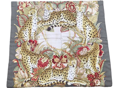 Lot 2152 - Salvatore Ferragamo silk scarf green and gold leopard design.