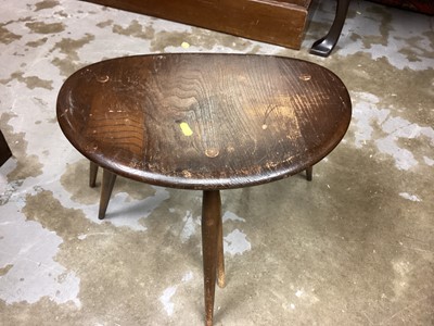 Lot 1362 - Nest of two Ercol pebble tables