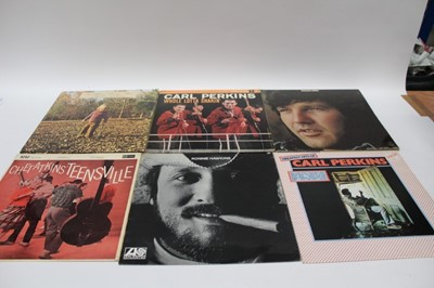 Lot 2229 - Two vintage brown cases of LP records including Tony Joe White, Allman Brothers Band, Carl Perkins, Ronnie Hawkins, Rush, Stevie Ray Vaughan, Buddy Guy, Duane Eddy, Chet Atkins and Don Gibson