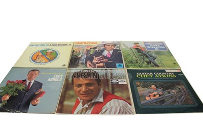 Lot 2230 - Two vintage black cases of LP records including Chet Atkins, Johnny Cash, Eddie Cochran, The Rolling Stones, Slim Whitman, Boxcar Willie, Jack Elliot and Hank Snow