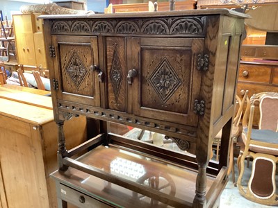 Lot 1364 - 17th century style oak two door cupboard with carved and panelled decoration on turned and block legs joined by stretchers, 92cm wide, 45.5cm deep, 85cm high