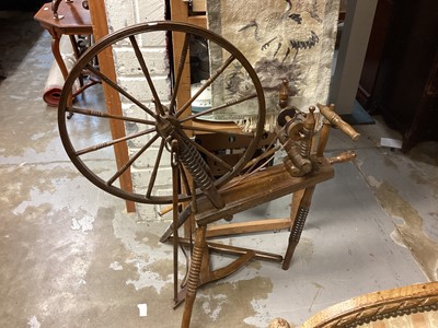 Lot 1365 - Large oak spinning wheel, together with a smaller example (2)