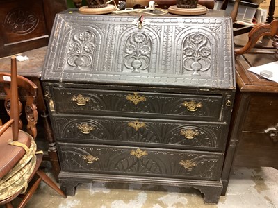 Lot 1388 - Antique heavily carved oak bureau with fitted interior and three long drawers below, 91cm wide, 51cm deep, 98cm high