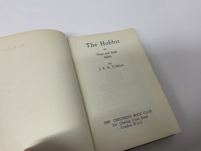 Lot 1702 - J R R Tolkien, The Hobbit, 1942 Children's Book Club edition, yellow cloth binding