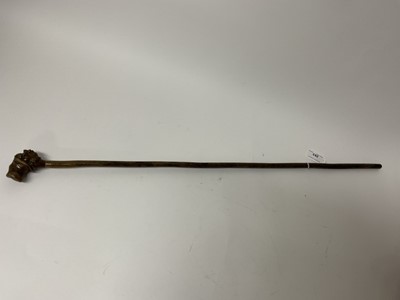 Lot 283 - 19th century novelty carved wooden walking stick with stylised head knop, 79cm long