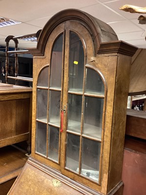 Lot 1398 - Queen Anne style burr wood bureau bookcase with shelved interior enclosed by two glazed doors, fitted writing compartment and three drawers below on turned legs joined by shaped stretchers, 68.5cm...