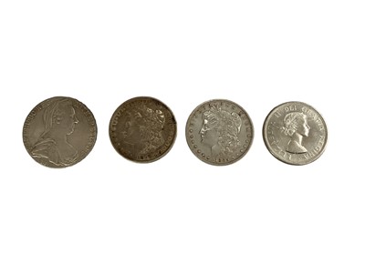 Lot 454 - World - Mixed silver coins to include U.S. Dollars 1879 GVF, 1885 GVF, Canada Dollar 1964 GEF, Austria Marie Theresa Thaler (Restrike) 1780, G.B. Three Half Pence 1839 (N.B. Obv: Scratches) otherwi...