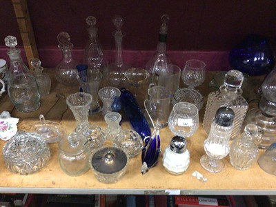 Lot 742 - Selection of glass ware including decanters,  oil lamp and various ornaments (1 shelf)