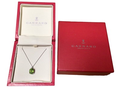 Lot 81 - Garrard & Co. peridot and diamond pendant in 9ct white gold setting on chain