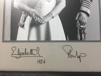Lot 67 - H.M.Queen Elizabeth II and H.R.H. The Duke of Edinburgh, fine signed presentation portrait photograph of the Royal couple wearing Orders and decorations , signed in ink' Elizabeth R 1986 Philip' in...