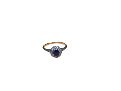 Lot 87 - Sapphire and diamond cluster ring