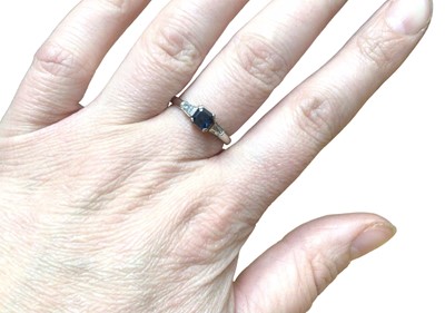 Lot 57 - Art Deco style sapphire and diamond three stone ring