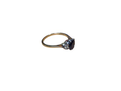 Lot 58 - Sapphire and diamond three stone ring with heart shape diamond shoulders on 18ct gold shank