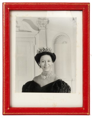 Lot 68 - H.R.H.The Princess Margaret Countess of Snowdon, signed presentation portrait photograph of the Princess wearing a diamond tiara and necklace, signed in ink 'Margaret 1987' (faded) in original gilt...
