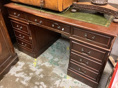 Lot 1422 - Reproduction mahogany twin pedestal desk with inset leather lined top