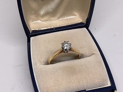 Lot 1094 - Diamond solitaire ring, estimated to weight 0.20ct, on 18ct yellow gold band