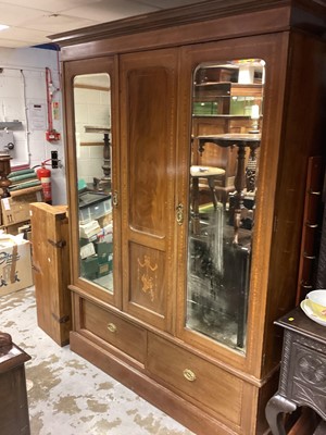 Lot 1428 - Edwardian inlaid mahogany wardrobe with central panelled door flanked by two bevelled mirror doors with two drawers below, 167cm wide, 55.5cm deep, 209cm high