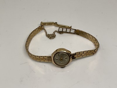 Lot 1093 - 9ct gold cocktail watch