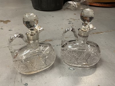 Lot 518 - Pair of George V silver mounted cut glass decanters (Birmingham 1911), retailed by J.C. Vickery, Regent Street.