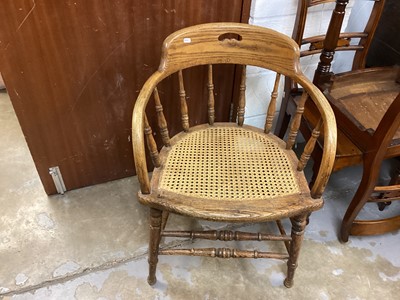 Lot 1432 - Oak stick back tub chair with cane seat together with an Edwardian hanging cabinet (2)