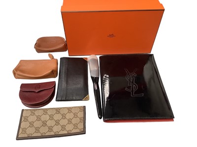 Lot 2155 - Designer accessories including Hermès shoe box, coin purses by Cartier, etc