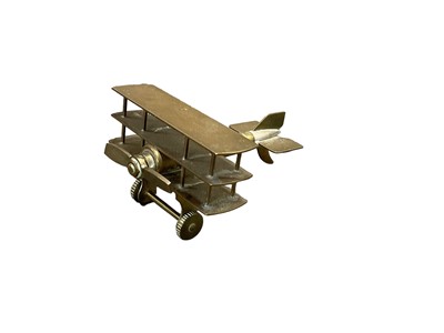 Lot 754 - First World War period Trench model of a triplane fashioned from a bullet, approximately 8.5cm in length.