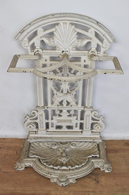 Lot 1430 - Victorian cast iron stick stand, with dolphin and shell ornament