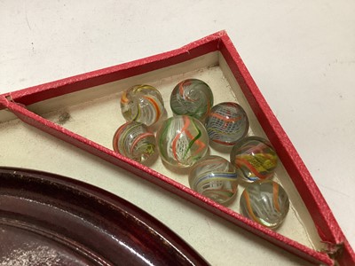 Lot 2414 - Vintage solitaire board with 33 coloured lattice twist glass marbles, in in original red card box