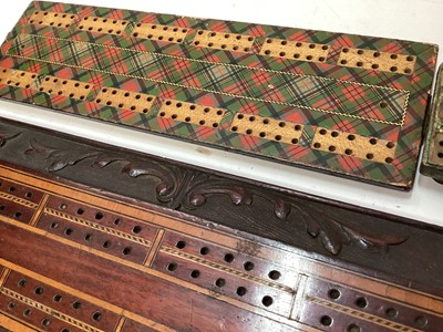Lot 2471 - Four antique cribbage boards to include a Regency cribbage board, Mauchline ware cribbage board, Tartan ware and a carved and inlaid wooden cribbage board (4)