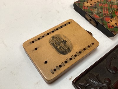 Lot 2471 - Four antique cribbage boards to include a Regency cribbage board, Mauchline ware cribbage board, Tartan ware and a carved and inlaid wooden cribbage board (4)