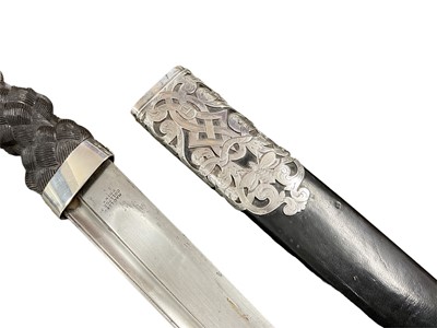 Lot 826 - Fine Victorian Scottish dirk with polished steel fullered blade, stamped MacLeod College St. Edinburgh, carved wood imitation basketweave grip