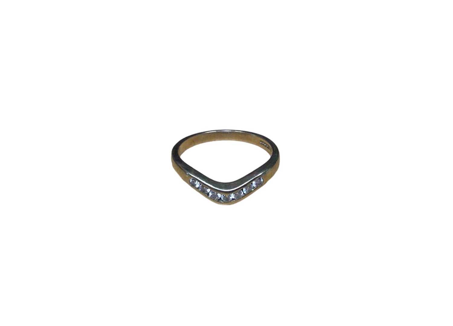Lot 32 - 9ct gold diamond eternity ring with seven brilliant cut diamonds, weighing approximately 0.25cts in total